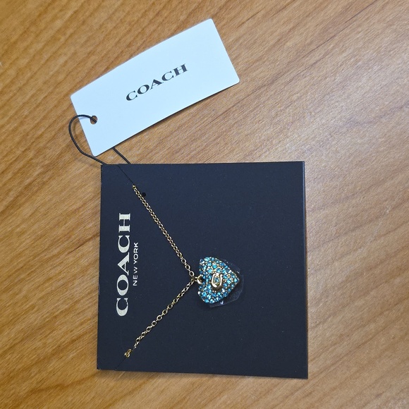 Coach Jewelry - Coach Gold Necklace with Blue Heart Pendant